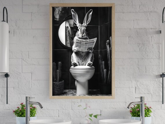 Rabbit Reading a Newspaper While Sitting on a White Toilet Poster