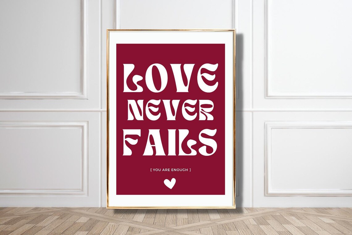 Love Never Fails Burgundy White Retro Typography Heart Quote Poster