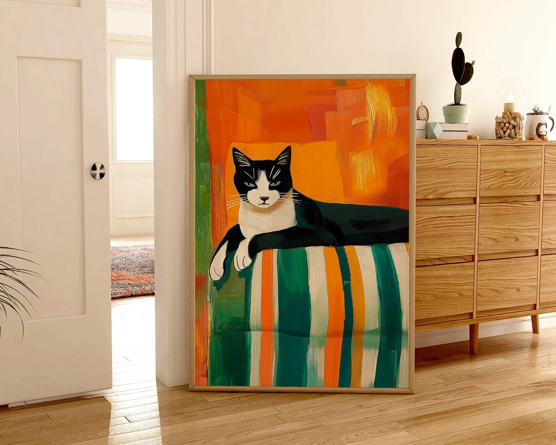 Tuxedo Cat Resting On A Striped Blanket With Warm Orange Wall Art - Image 3