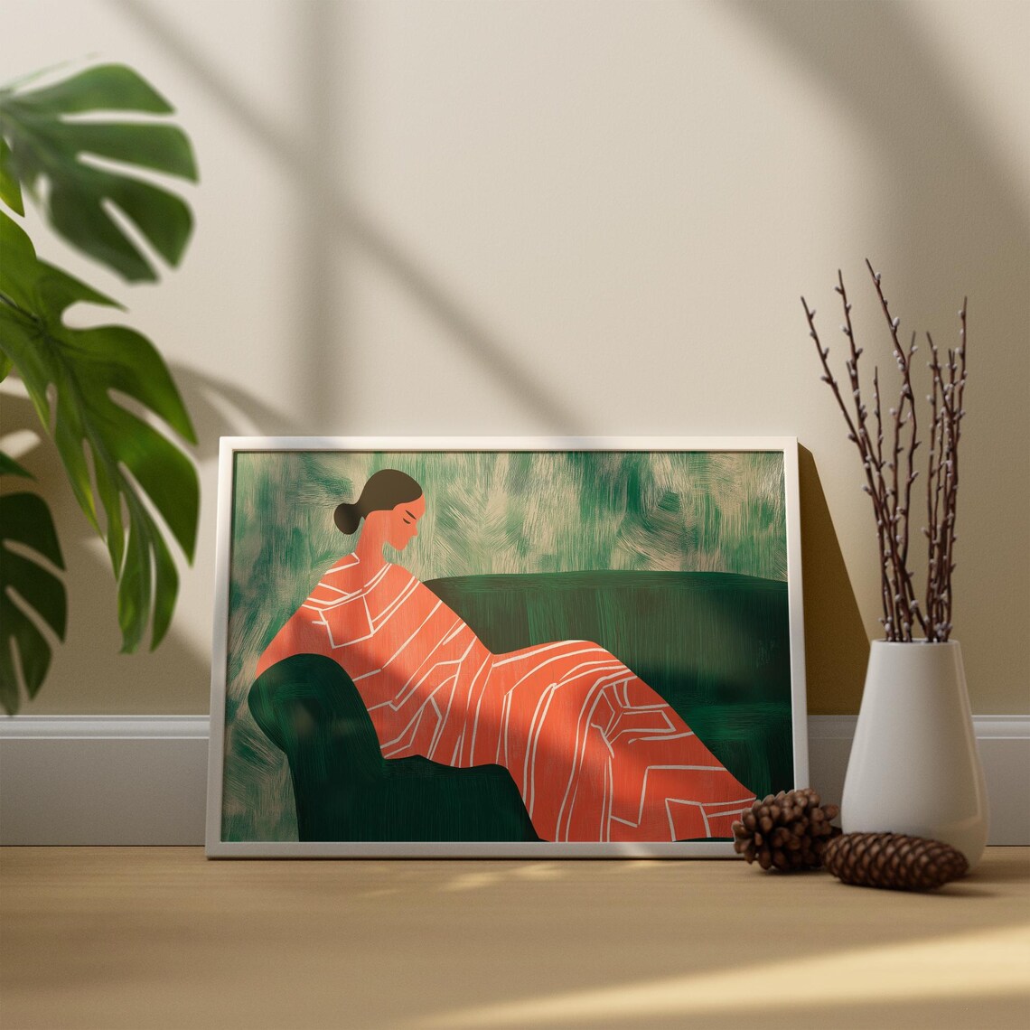 Lounging Woman in Coral Geometric Dress on Green Couch Poster - Image 4