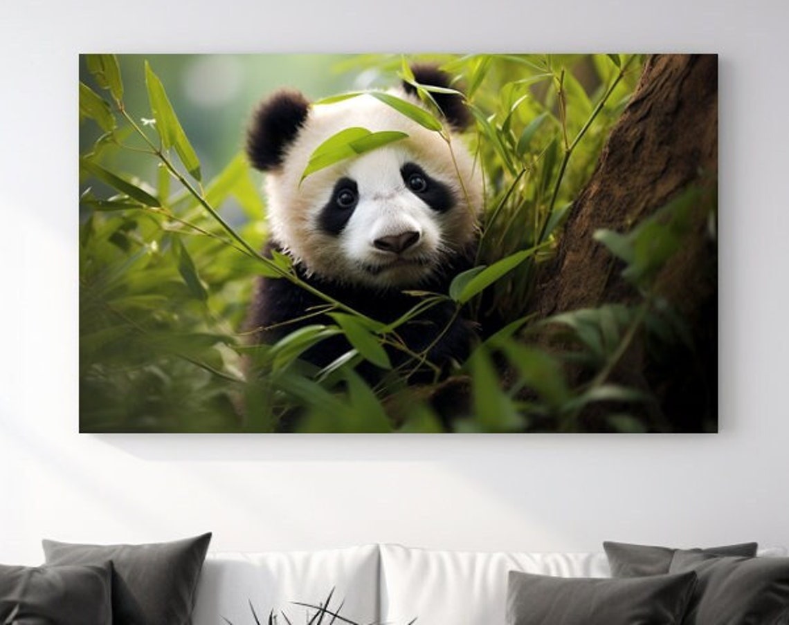 Baby Giant Panda Cub Peeking Through Green Bamboo Leaves Poster