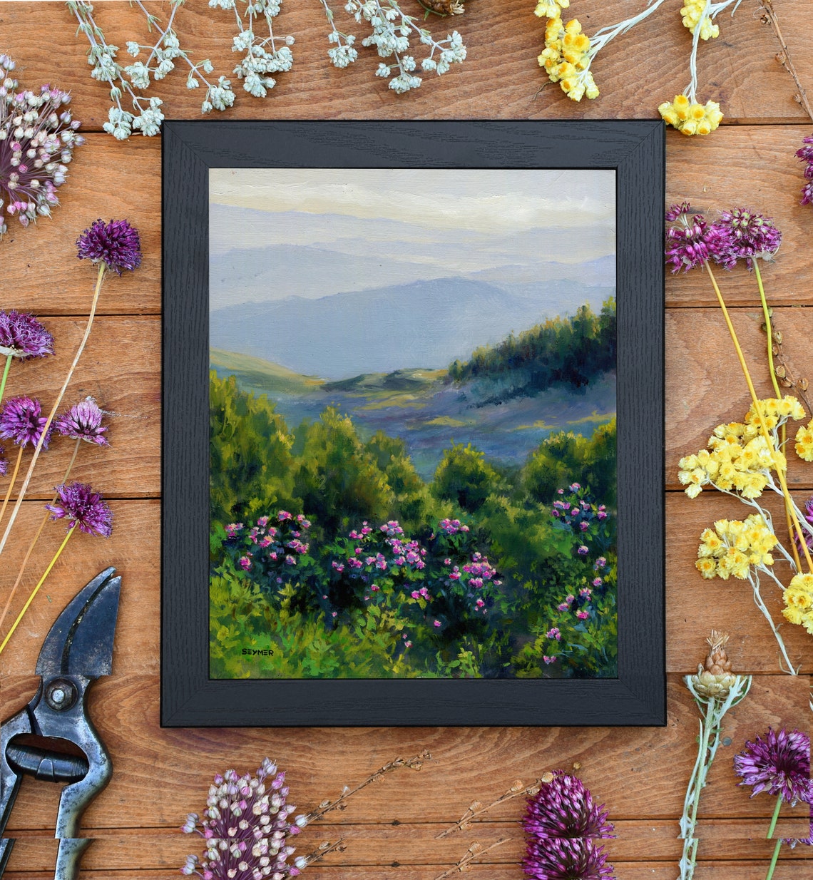 Mountain Valley with Pink Wildflowers under Misty Blue Peaks Poster - Image 6