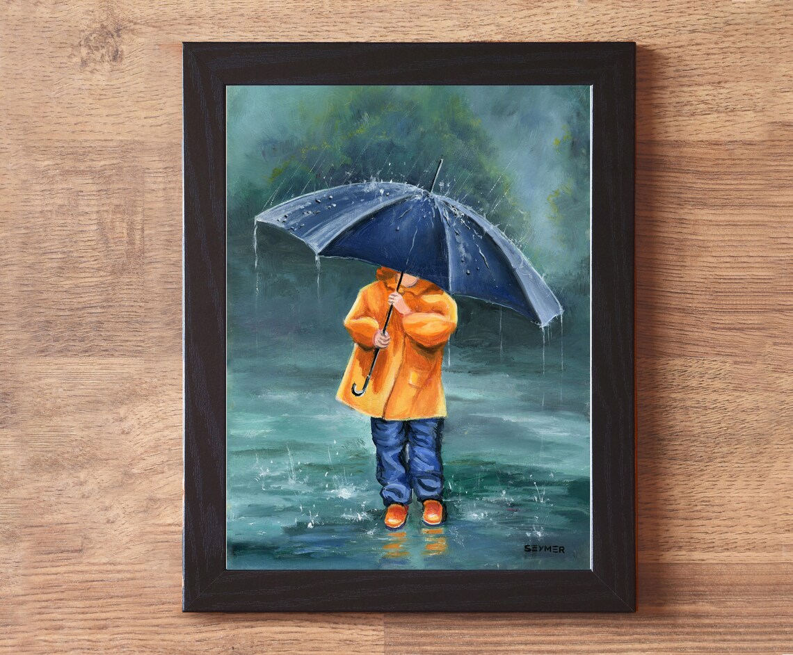 Child in an Orange Raincoat Holding a Navy Umbrella in the Rain Poster - Image 6