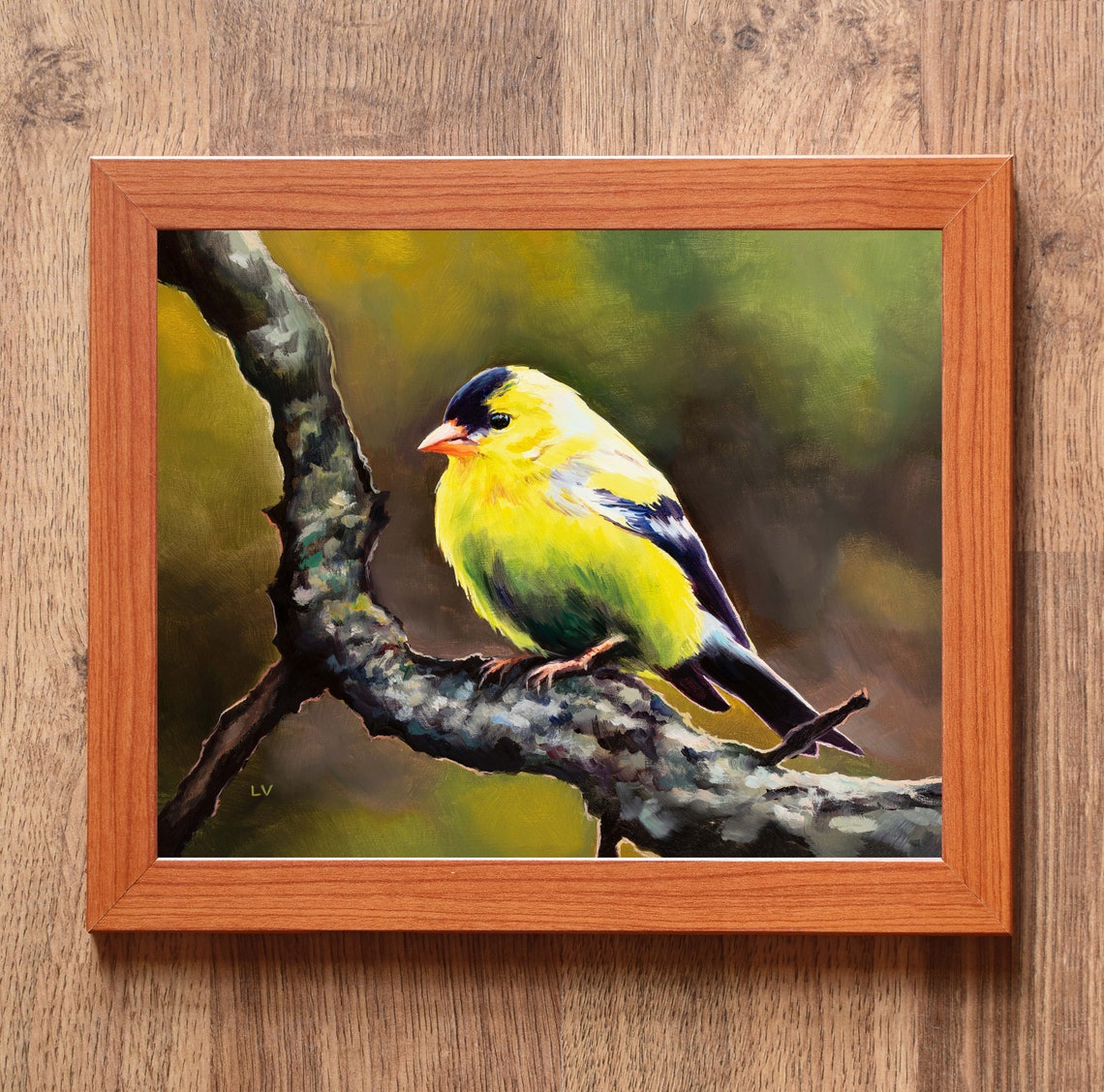American Goldfinch Perched on a Mossy Branch in Yellow Plumage Poster