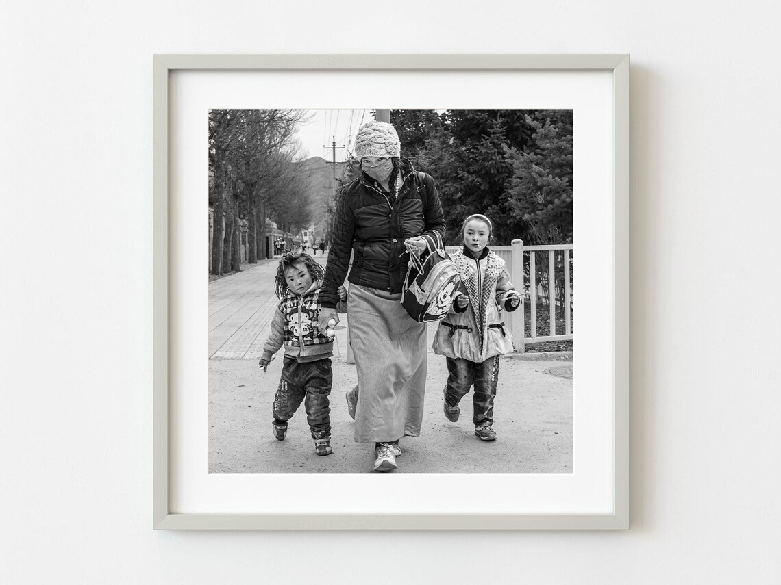 Black and White Candid Street Photo of Mother and Two Children Poster