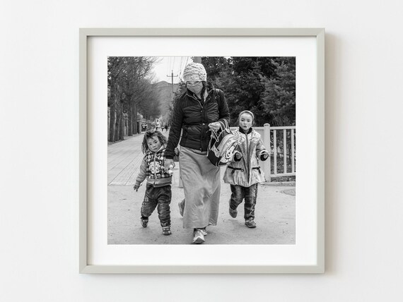 Black and White Candid Street Photo of Mother and Two Children Poster