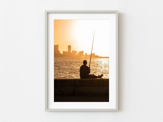 Cuban Man Fishing At Sunset In Havana Wall Art