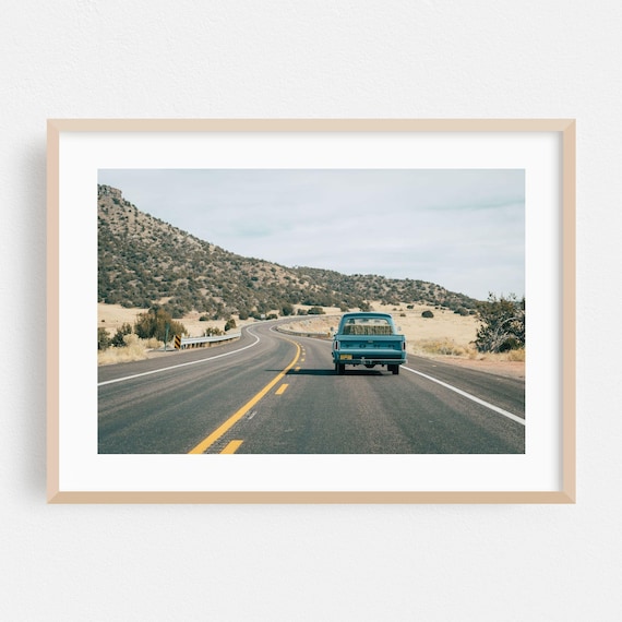 Vintage Blue Ford Pickup Truck on Desert Highway Photo Poster
