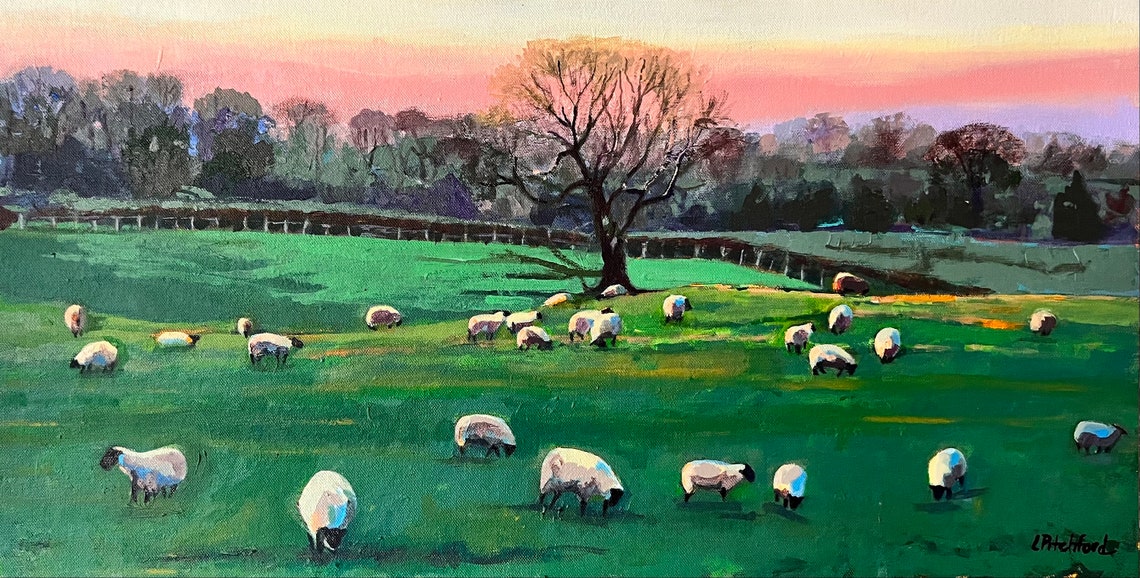 Sheep Grazing in a Lush Green Pasture Under a Soft Dusk Sky Poster
