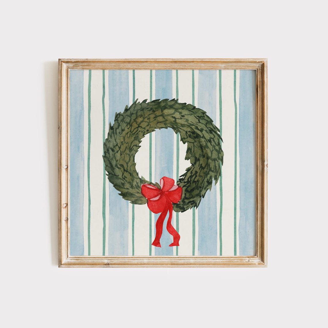 Green Christmas Wreath with Red Bow on Striped Blue Background Poster