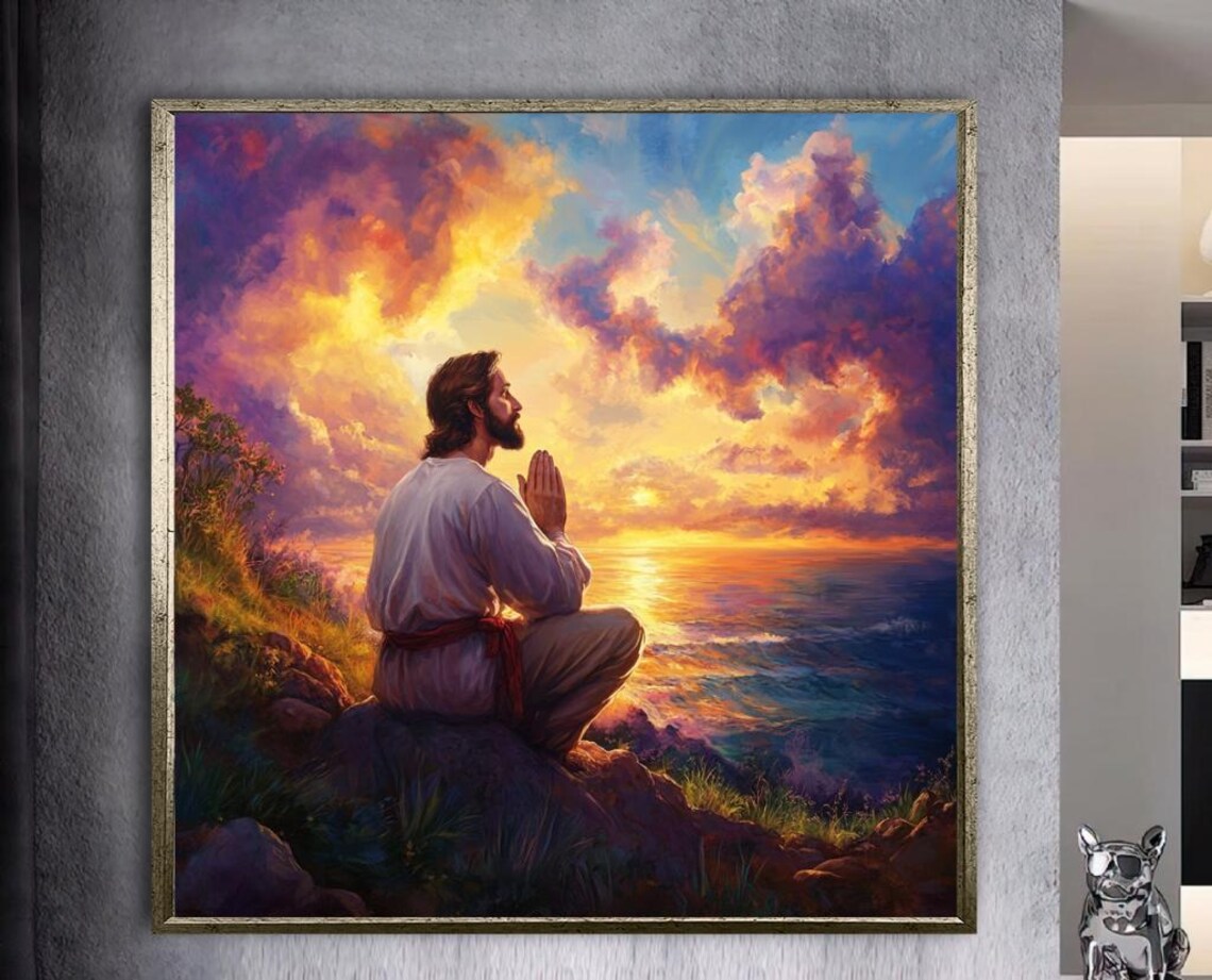 Jesus at Prayer Poster: Kneeling Before a Blazing Sunset Over the Ocean