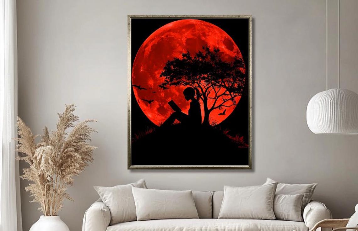 Red Moon Silhouette Wall Art Girl Reading Under Tree With Bold Lunar Background Striking Night Scene For Modern Decor