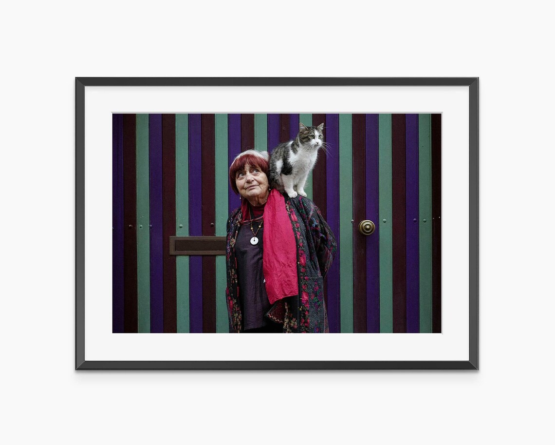 Agnes Varda Portrait with Cat Before Colorful Striped Doors Photo Poster