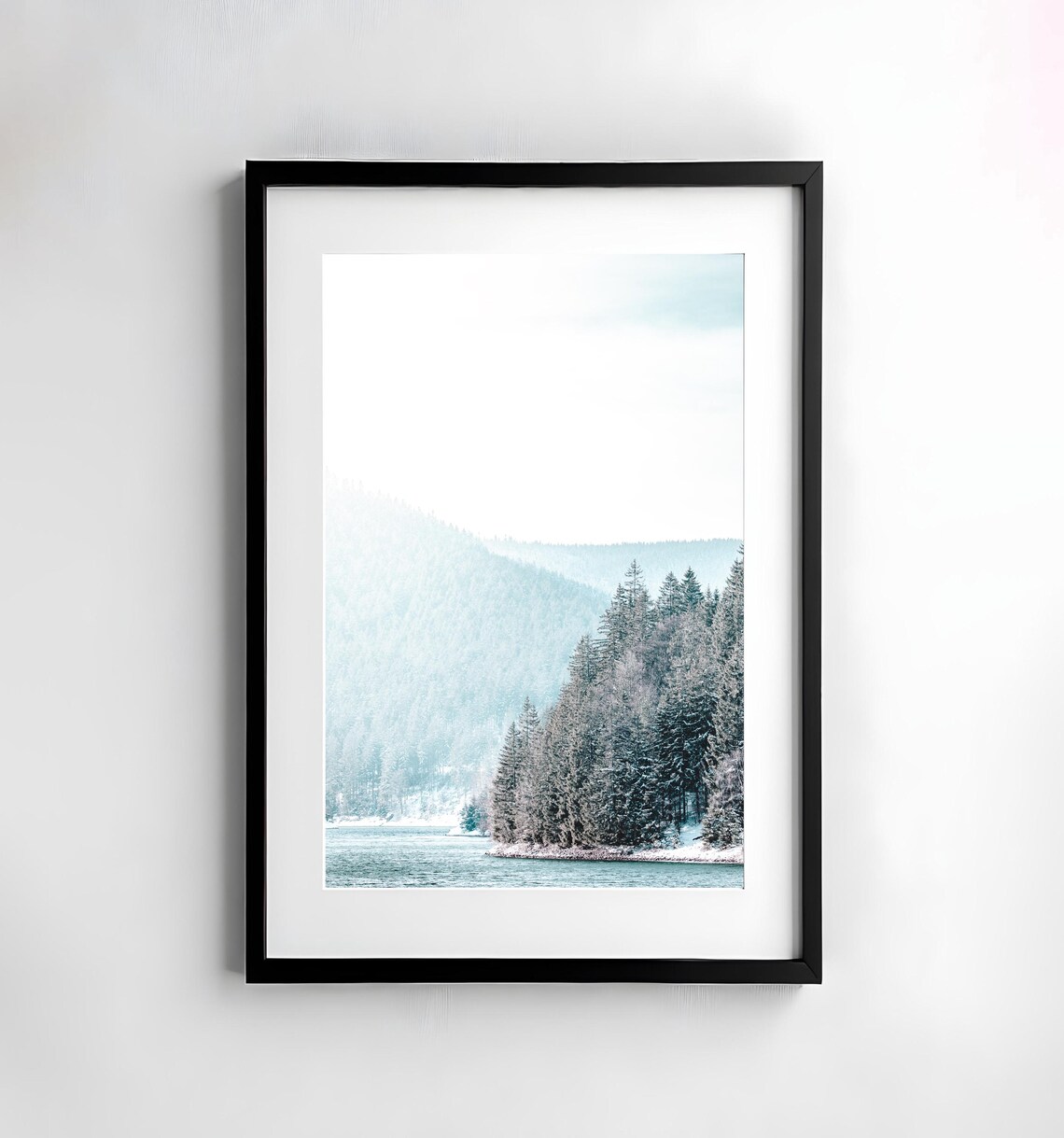 Tall Snow-Covered Pines Along a Calm Winter Lake Photo Poster