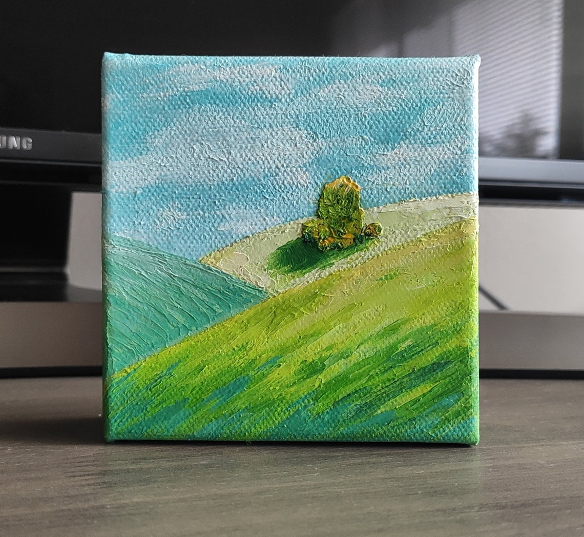Rolling Green Hills With Lone Tree Under Bright Blue Sky Art Poster