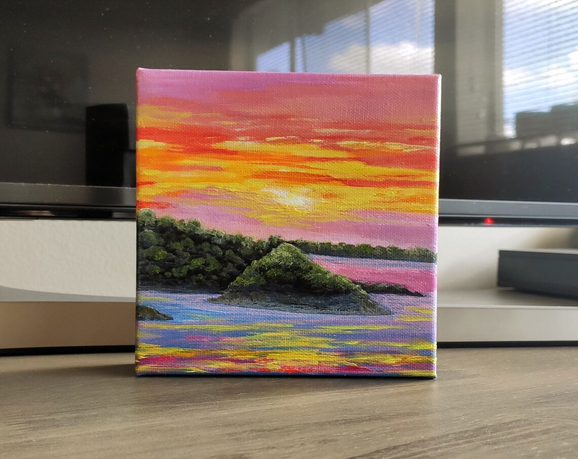 Pink Orange Sunset Sky Over Water With Green Island Rocks Art Poster - Image 4