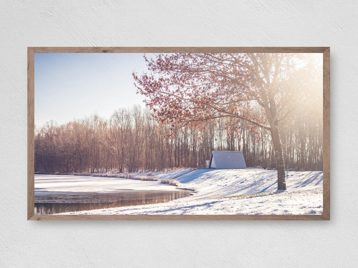 Frozen Pond Winter Morning Golden Sunlight Snowy Shore Travel Poster