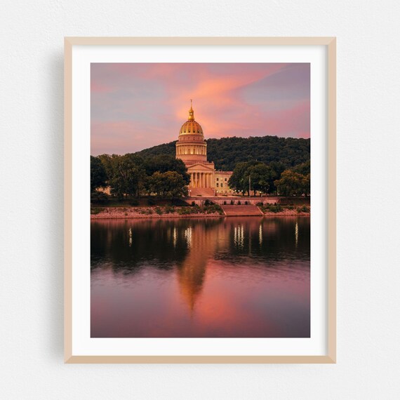 West Virginia State Capitol At Sunset Reflecting On The River Poster