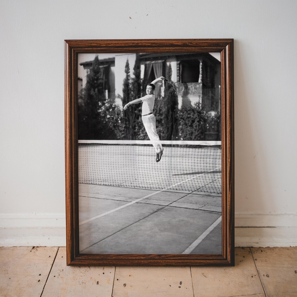 Vintage Tennis Player Leaping Over the Net Black and White Sports Poster