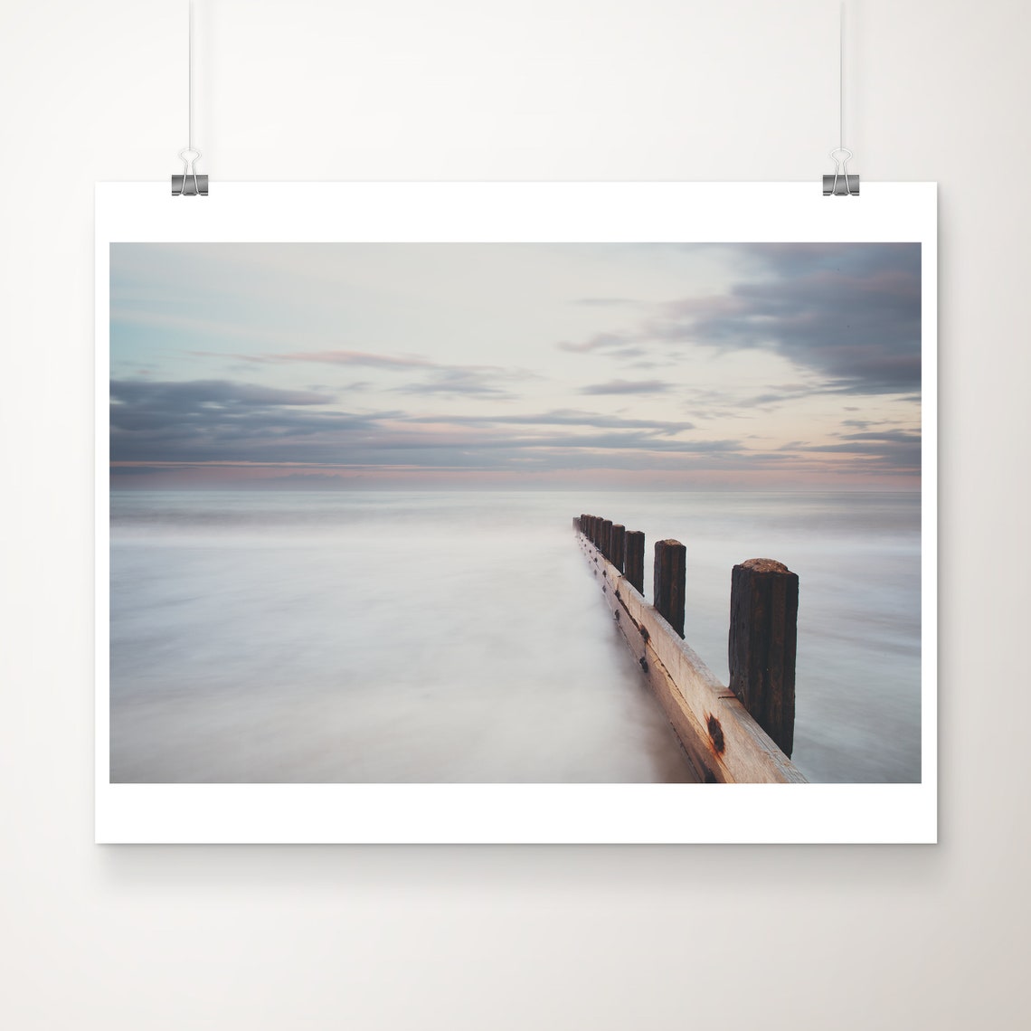 Weathered Wooden Groynes on Misty Beach Dawn Minimalist Coastal Poster