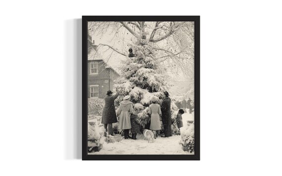 Vintage Family Decorating A Snowy Outdoor Christmas Tree Poster