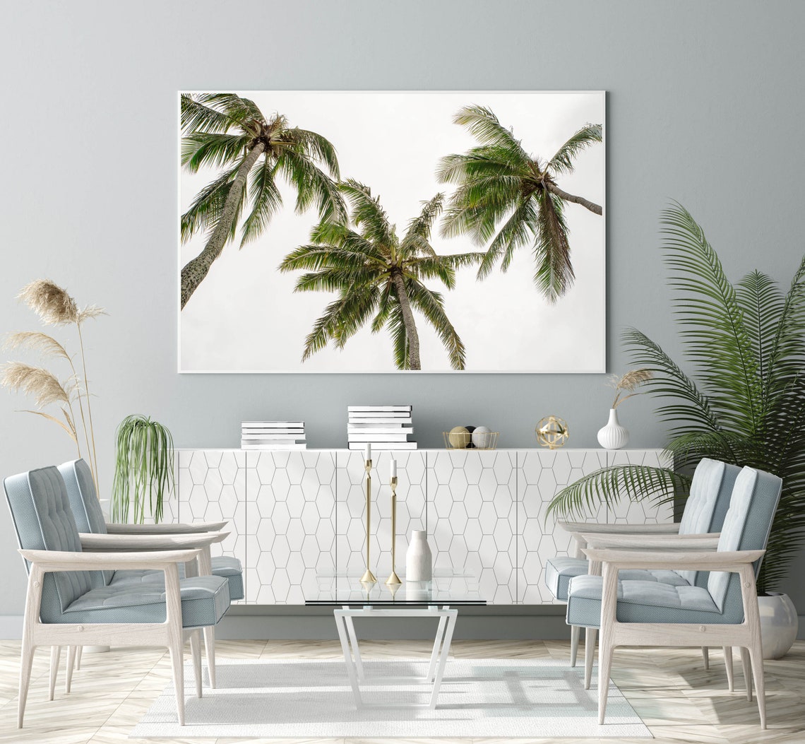 Upward View of Coconut Palm Trees Against a White Sky Poster - Image 3