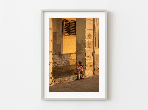 Little Girl Sitting on Old Porch Steps in Warm Golden Light Poster