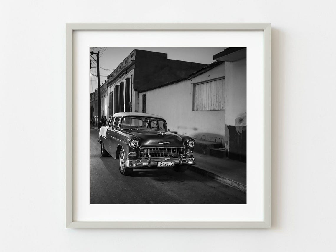 Vintage 1950s Sedan Parked On A Quiet Old Street At Dusk Photo Poster
