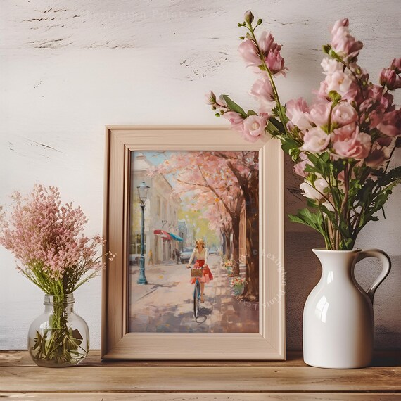 Woman Riding Bike Down Cherry Blossom Street Spring Town Wall Art
