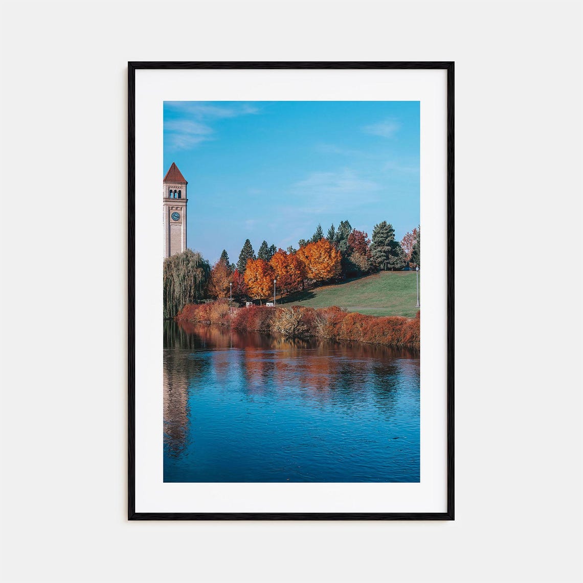 Spokane Clock Tower by the River With Fall Foliage Colors Poster