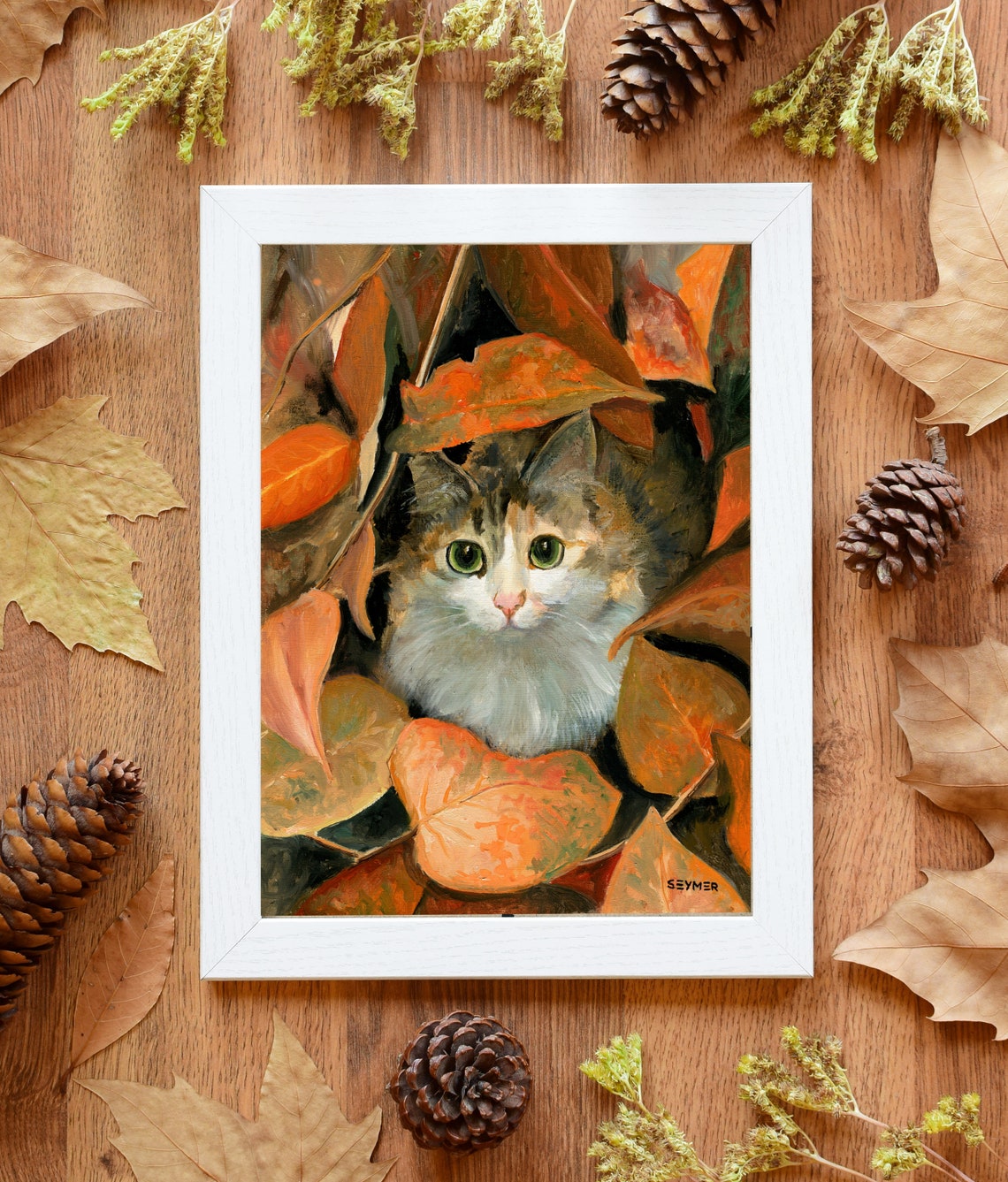 Calico Cat with Green Eyes Hiding among Autumn Leaves Poster - Image 2