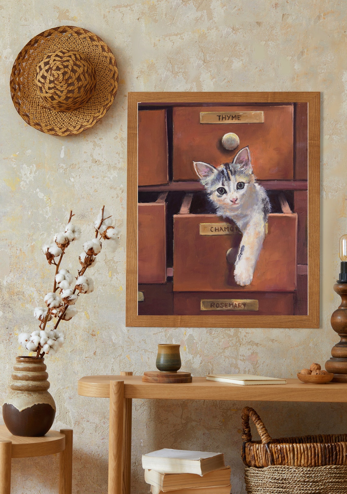 Playful Kitten Climbing Out of Vintage Herb Cabinet Drawers Poster - Image 2
