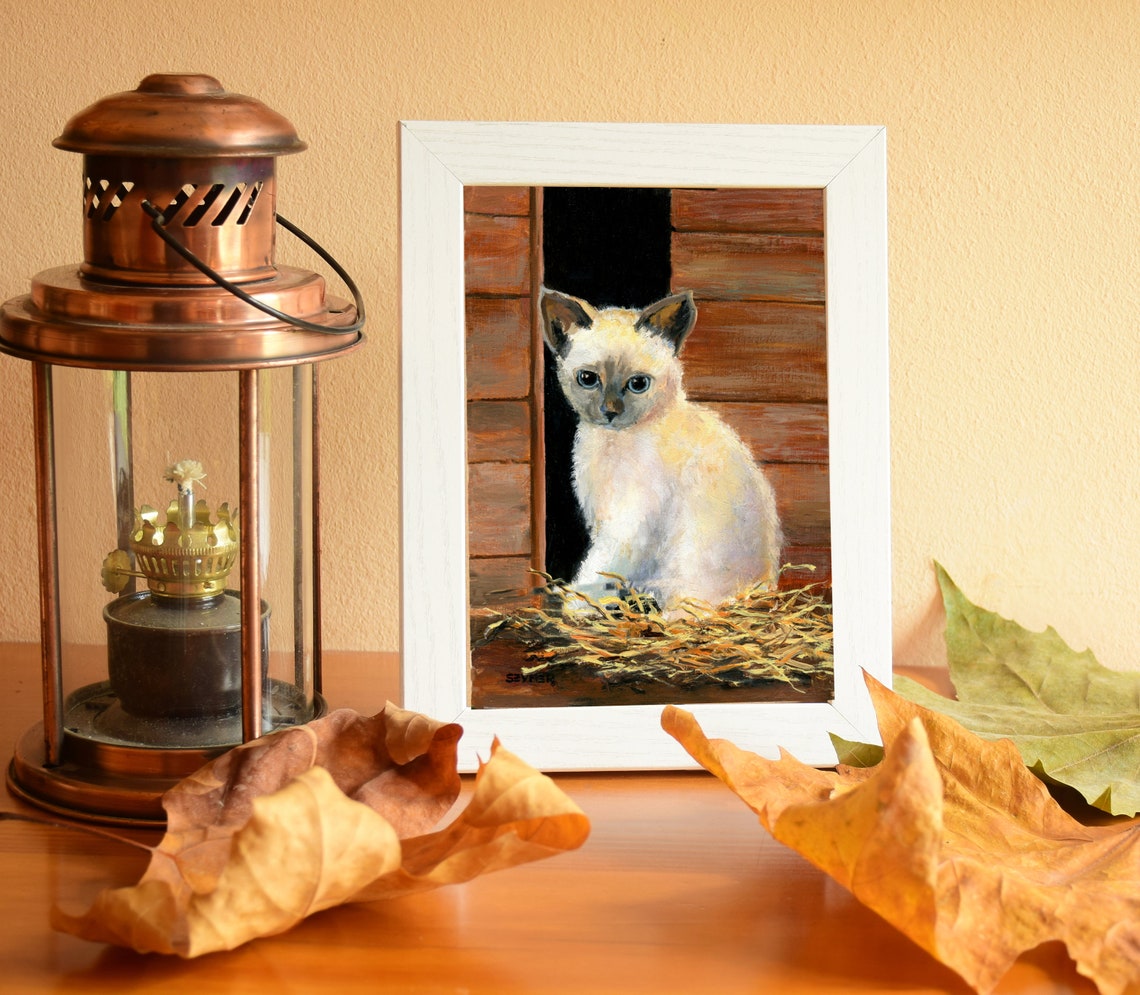 Cream Kitten with Blue Eyes Peeking from a Wooden Barn Door Poster - Image 2