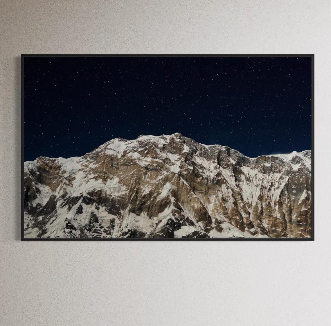 Snow Capped Mountain Peak Beneath a Starry Night Sky Photo Poster