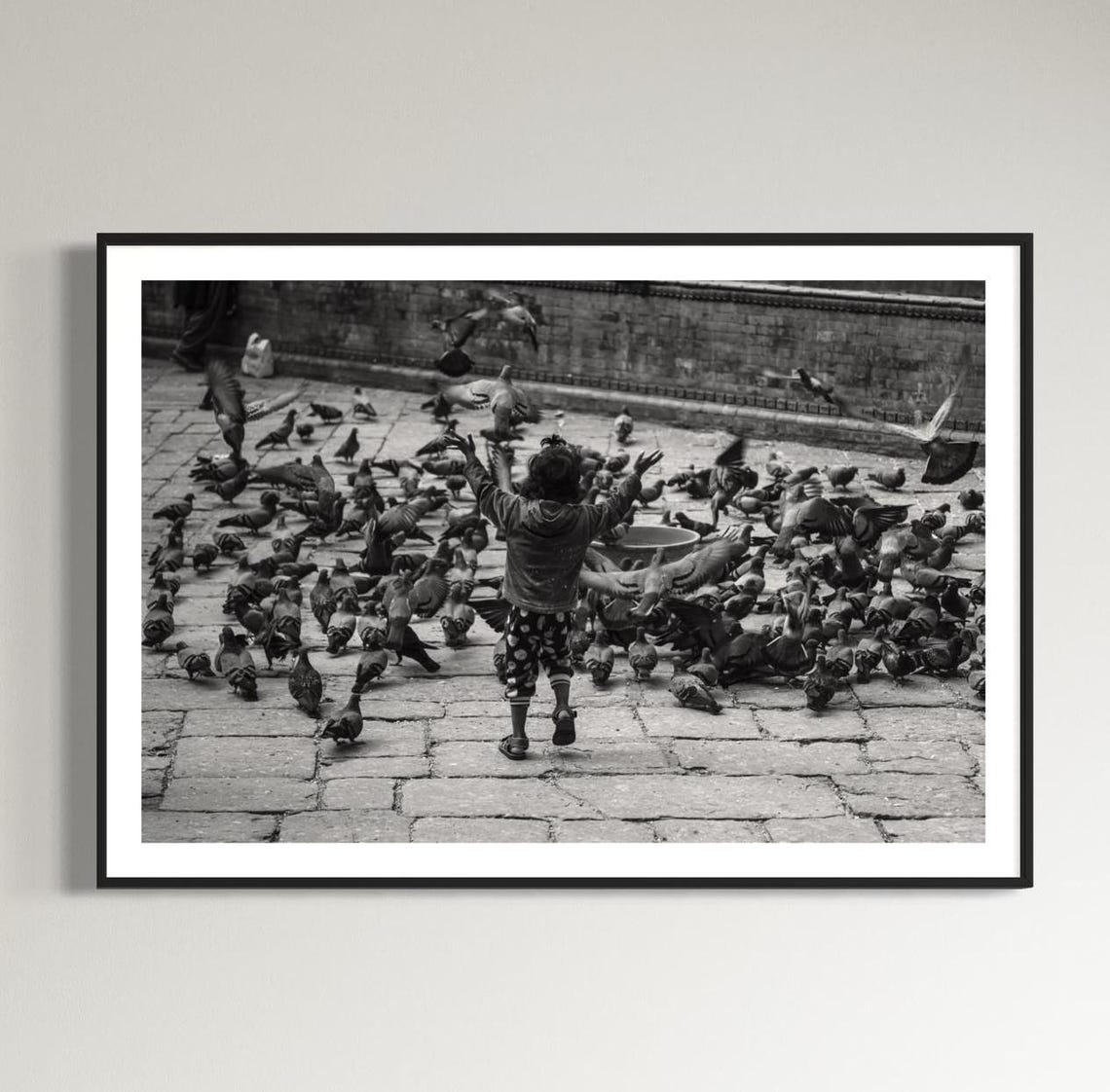 Kathmandu Child Scattering Pigeons Black And White Photo Poster