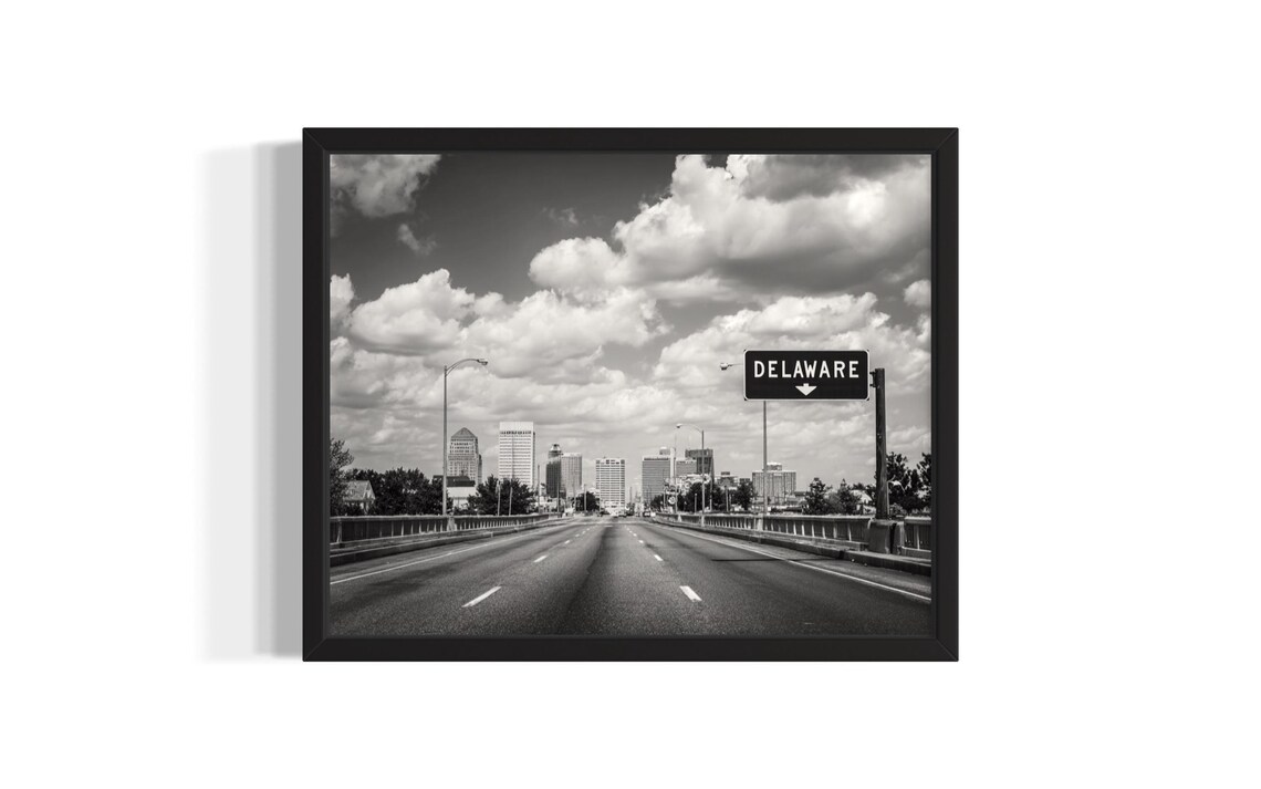 Delaware Sign Highway into City Skyline Black and White Photo Poster