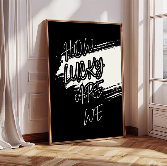 How Lucky Are We Script Brushstroke Black and White Motivational Poster