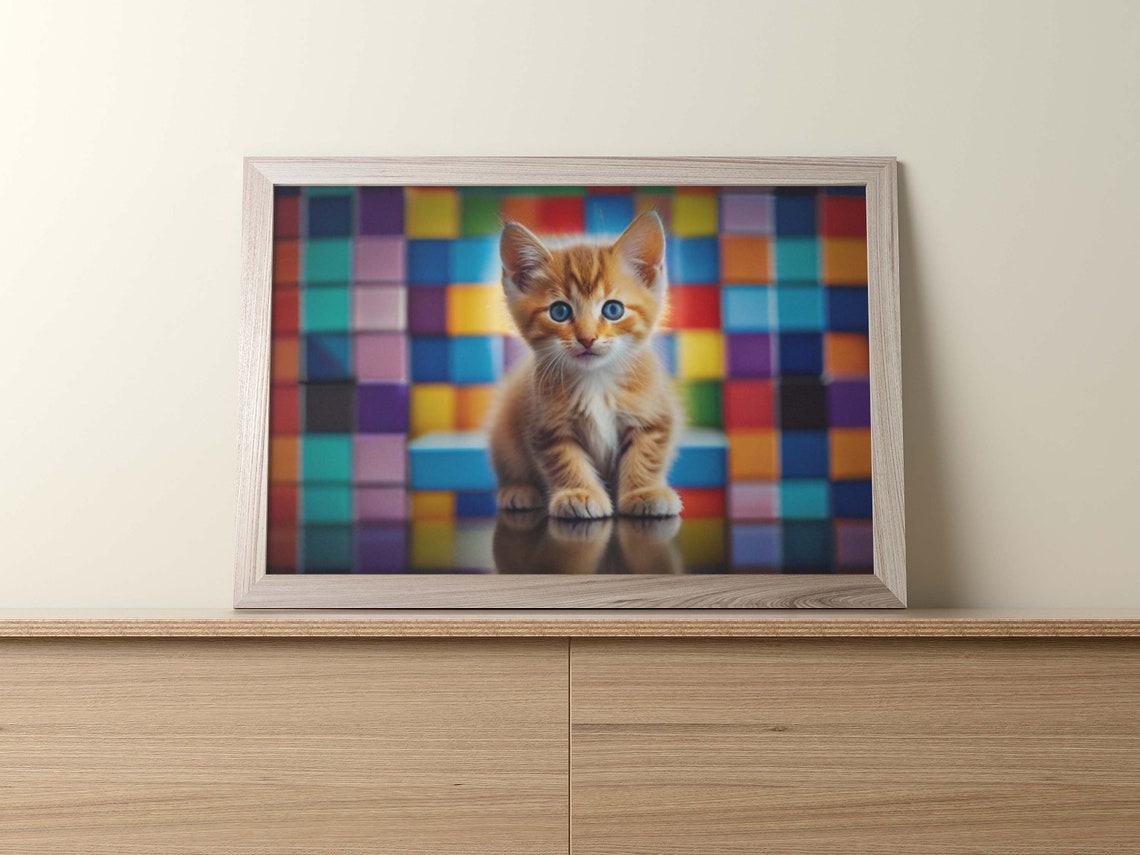 Sweet Orange Blue-Eyed Kitten Posed Before a Rainbow Cube Wall Poster - Image 2