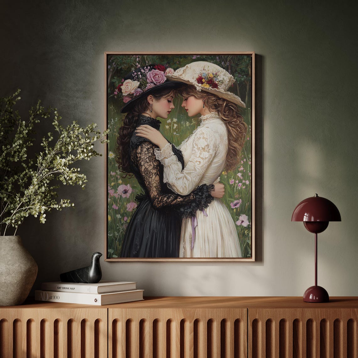 Two Women in Vintage Flower Hats Embracing in a Garden Poster