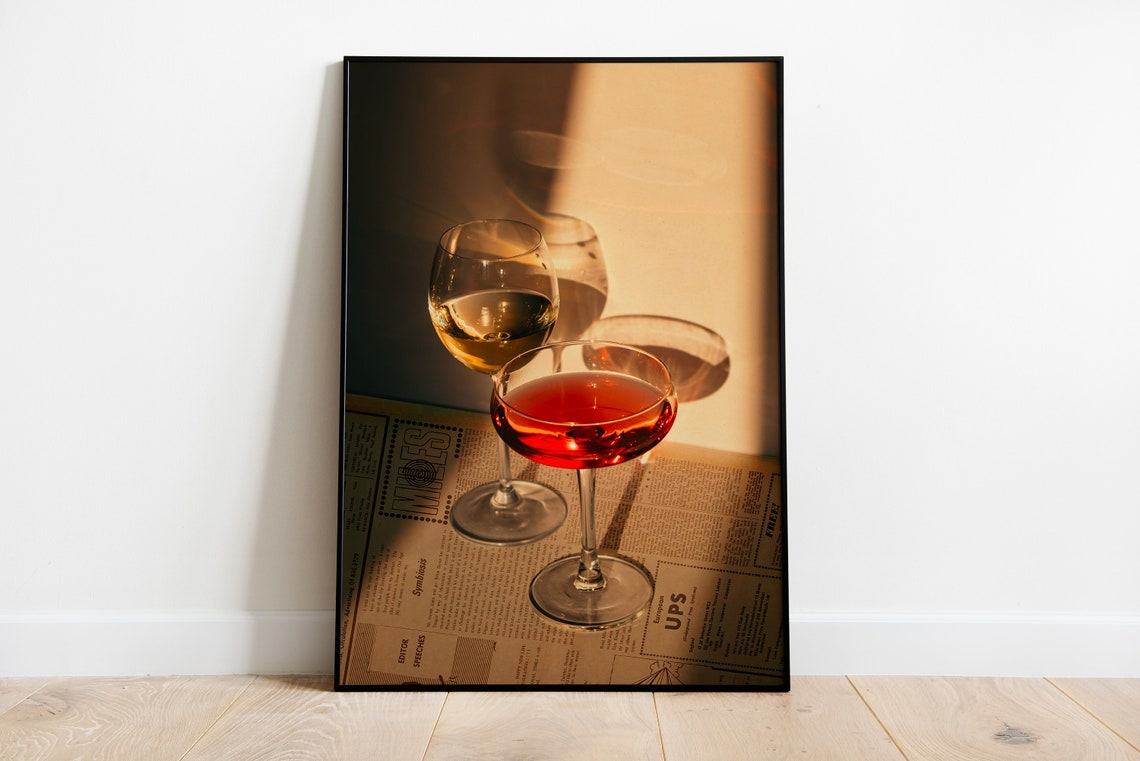 Golden Hour Wine Glasses Poster Layered Over Retro Newspaper Backdrop - Image 3