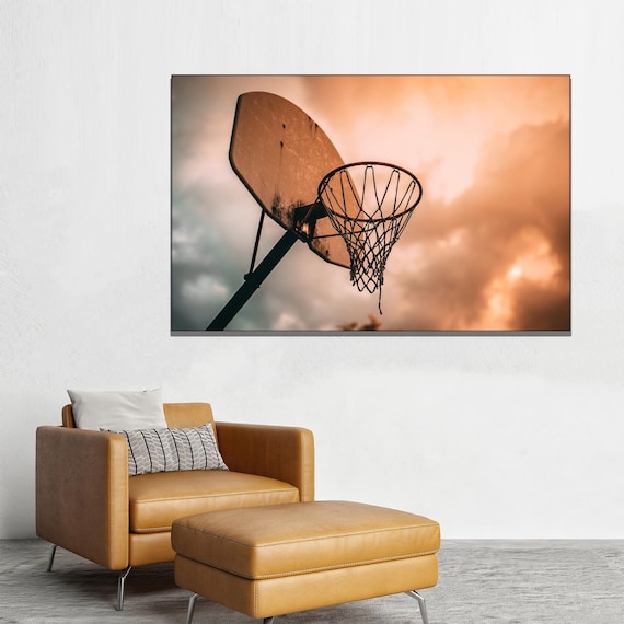 Basketball Hoop Silhouette Against Dramatic Sunset Sky Poster