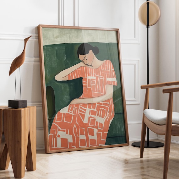 Resting Woman In A Coral Patterned Dress Against Deep Green Wall Art