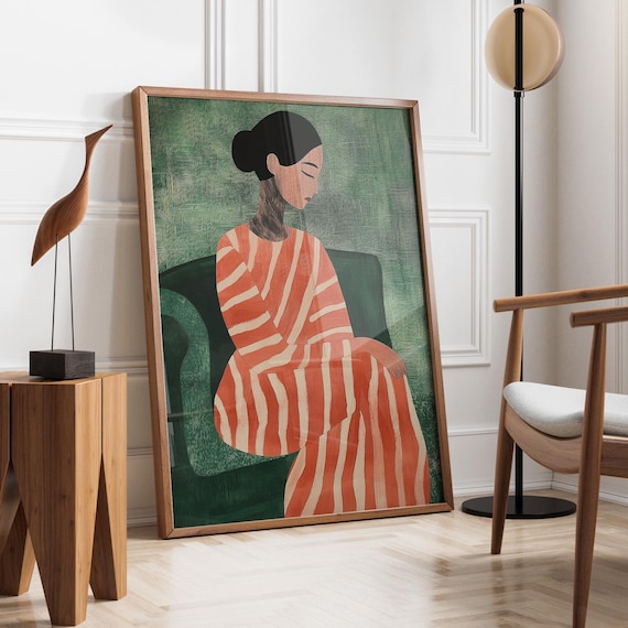 Seated Woman in Orange Striped Dress Green Background Poster