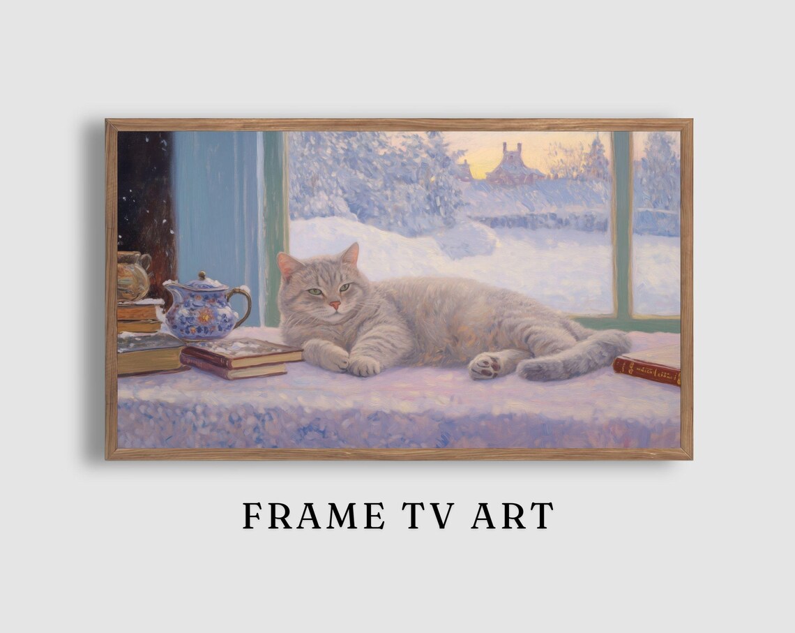 Grey Cat Lounging by a Snowy Window with Books and a Floral Teapot Poster