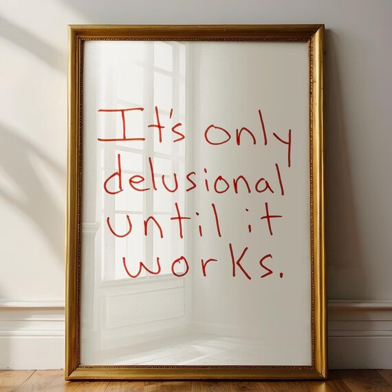 It Is Only Delusional Until It Works Red Handwritten Motivational Poster