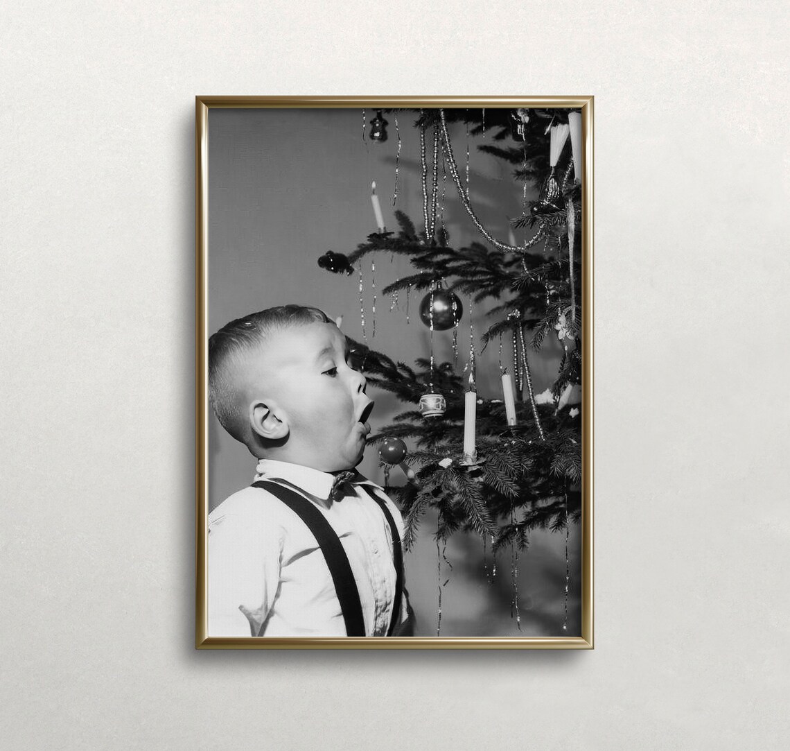 Boy Blowing Out Candle On Christmas Tree Black And White Photo Print