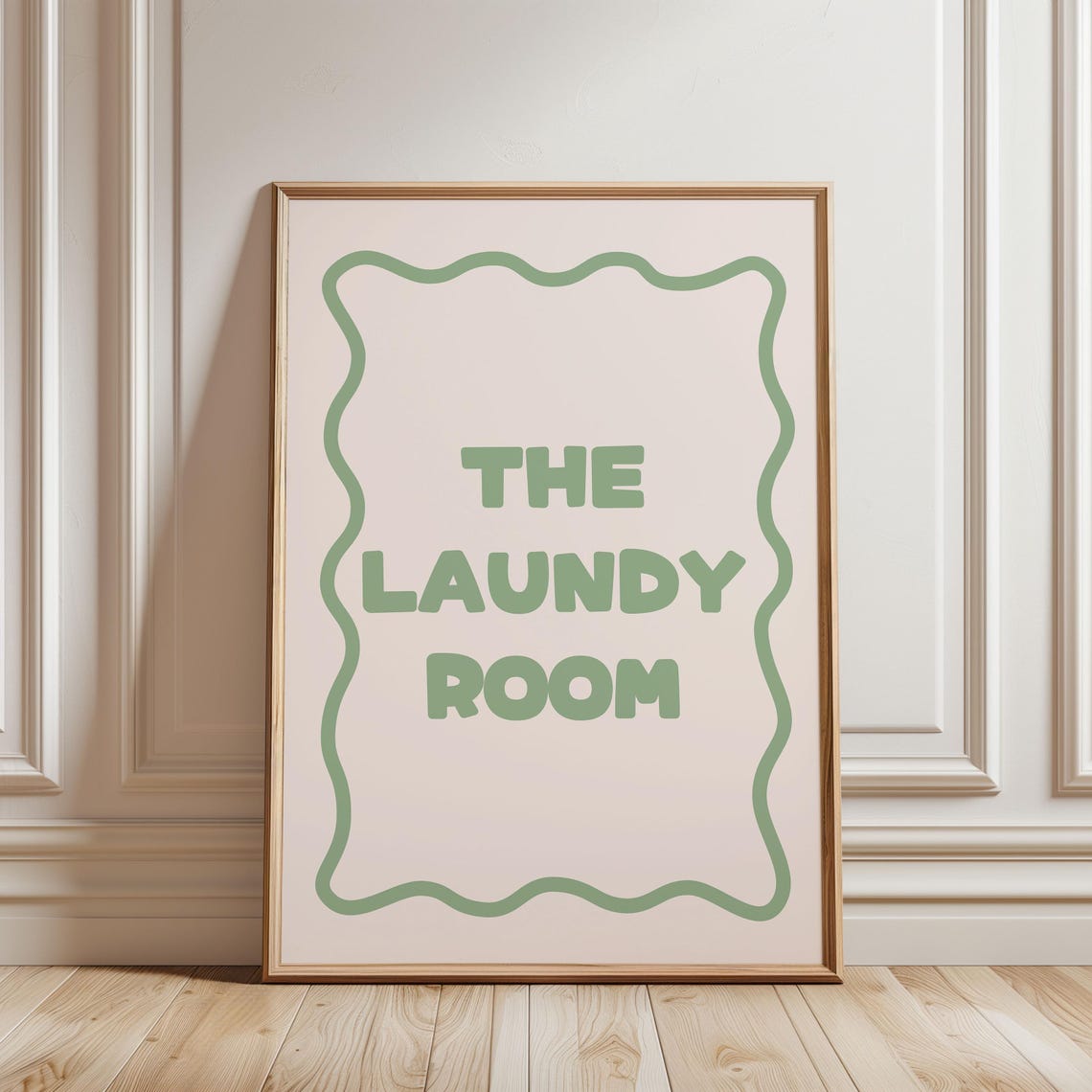 The Laundy Room Sage Green Lettering Wavy Border Cream Wall Art