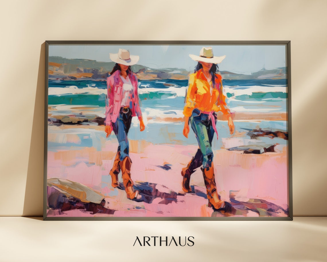 Two Cowgirls In Cowboy Hats Strolling On A Pink Beach Poster
