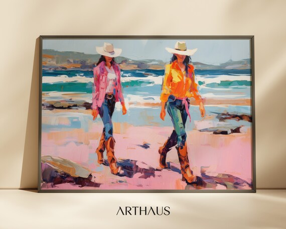 Two Cowgirls In Cowboy Hats Strolling On A Pink Beach Poster
