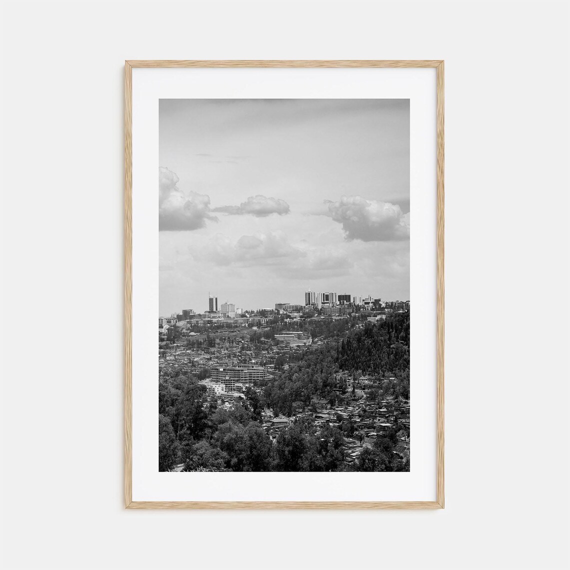 City Skyline Rising Above Forested Hills Black And White Poster